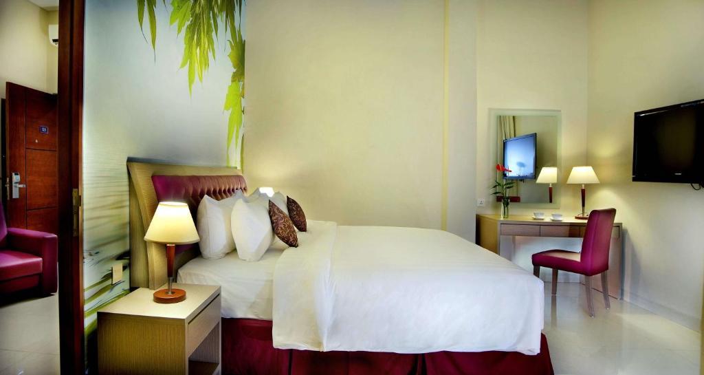 Kuta Central Park Hotel Værelse billede